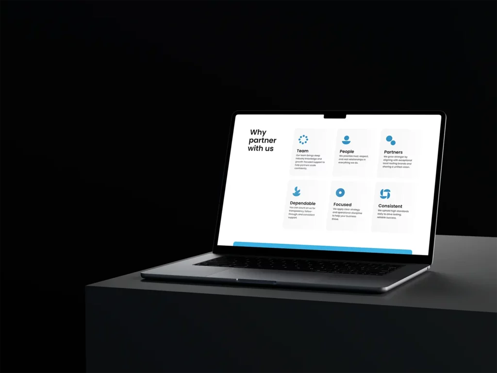Stonegrove Roofing Partners Mockup on a Macbook on a table in black